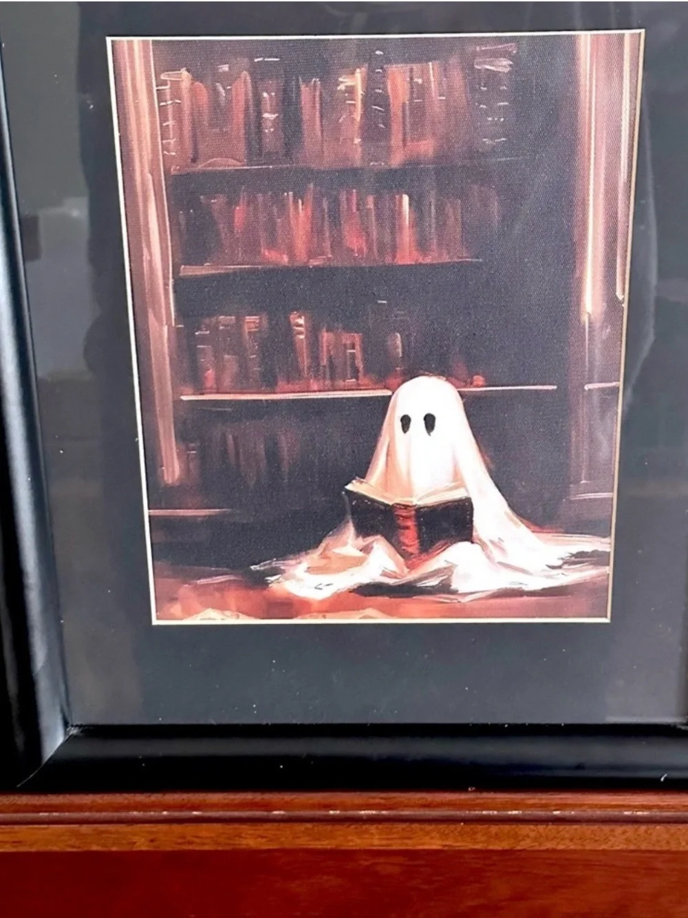 Cute Spooky Ghost Reading a Book in a Library Canvas Print Black Framed Wall Art